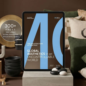 Tablet displaying a book cover titled 'The Architecture of Control' on a decorative surface.